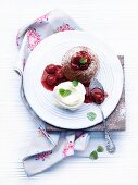 Individual baked chocolate pudding with cherries