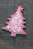A decorated biscuit in the shape of a Christmas tree