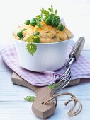 Potato soufflé with peas