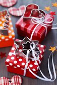 Gift boxes decorated with satin ribbons and pastry cutters