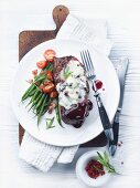 Rump steak with blue cheese butter and green beans