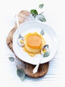 Crème caramel with mint leaves