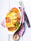 Pork fillet au gratin with apples and cheese