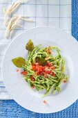 Trofie pasta with pesto and tomatoes