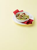 A Bowl of Penne Pasta with Roasted Tomatoes, Basil and White Beans