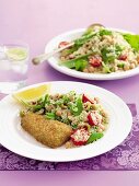 Breaded fish with couscous and chickpeas