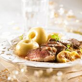 Duck breast with figs and dumplings