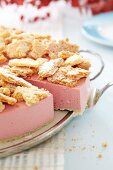 Strawberry ice cream torte with a biscuit crust