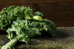 Kale leaves on a stone slab