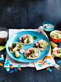 Mini tacos with guacamole and crab