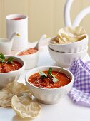 Tomato and lentil soup with coriander and poppadoms