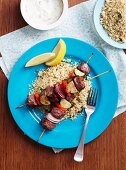 Lamb skewers on herb couscous