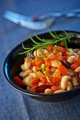Bean salad with white beans, tomatoes and duck