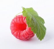 A raspberry with leaf (close-up)