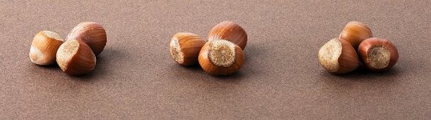 Three groups of hazelnuts