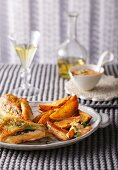 Stuffed chicken breast with potato wedges
