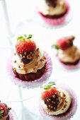Cupcakes with chocolate-dipped strawberries