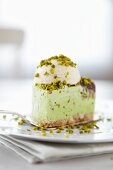 Pistachio torte with a scoop of ice cream