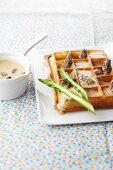Savoury waffle with green asparagus and a morel sauce