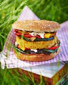 A vegetable burger at a picnic