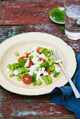 Bean salad with tomatoes, feta and mint