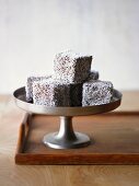 Lamingtons coated in grated coconut