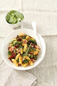 Pan-fried gnocchi with bacon, spinach and sundried tomatoes