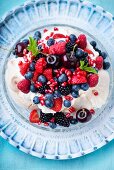 Pavlova with fresh fruit and cream (view from above)