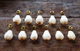 Peeled pears, in rows