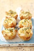 Mini puff pastry pies filled with pears and thyme