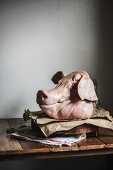 A Whole Fresh Pig Head from the Buther on a Table