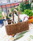 A basket with garden utensils