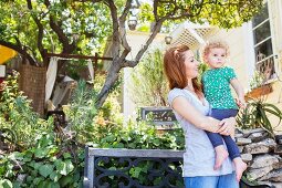 Mother looking at child in arms