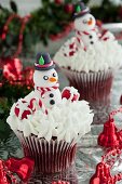 Red Velvet cupcakes with cream cheese frosting and snowmen