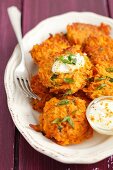 Carrot fritters with yoghurt