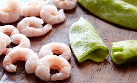 Shrimp next to Sugar Snap Peas