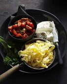 Tagliatelle with tomatoes and Caprino