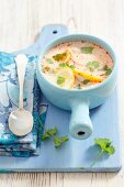 Chicken and lemon soup with coriander leaves