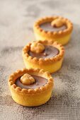 Chocolate tartlets with nuts