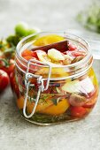 Bottled tomatoes in preserving jars