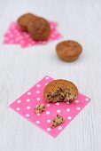Banana muffins with chocolate on spotted paper napkins