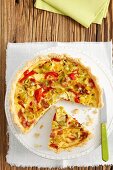 Quiche with ham, leek and peppers