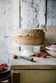 Strawberry layer cake with almond sponge, chocolate and salted caramel mousse
