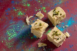 Soan papdi (sweet made from gram flour with almonds and pistachios, India)