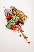Surf and Turf: halibut and oxtail with creamed spinach, cherry tomatoes and oxtail jus
