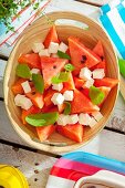 Watermelon salad with feta and mint for a summer picnic