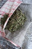 Dried peppermint leaves in a linen bag