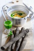 Black salsify & orange soup with parsley oil