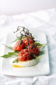 Grilled cherry tomatoes on mozzarella with chilli sugar