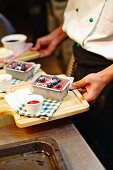 Individual blueberry cakes in a restaurant